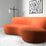 Sofa upholstered in a orange velvet upholstery fabric