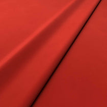 Fabric swatch of a red velvet upholstery fabric