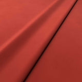 Fabric swatch of a orange velvet upholstery fabric
