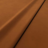 Fabric swatch of a brown velvet upholstery fabric