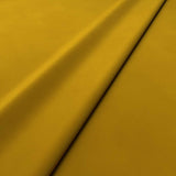 Fabric swatch of a yellow velvet upholstery fabric