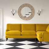 Sofa upholstered in a yellow velvet upholstery fabric