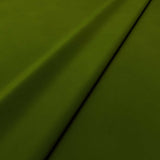 Fabric swatch of a green velvet upholstery fabric