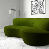Sofa upholstered in a green velvet upholstery fabric