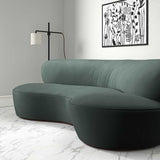 Sofa upholstered in a blue velvet upholstery fabric