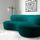 Sofa upholstered in a blue velvet upholstery fabric