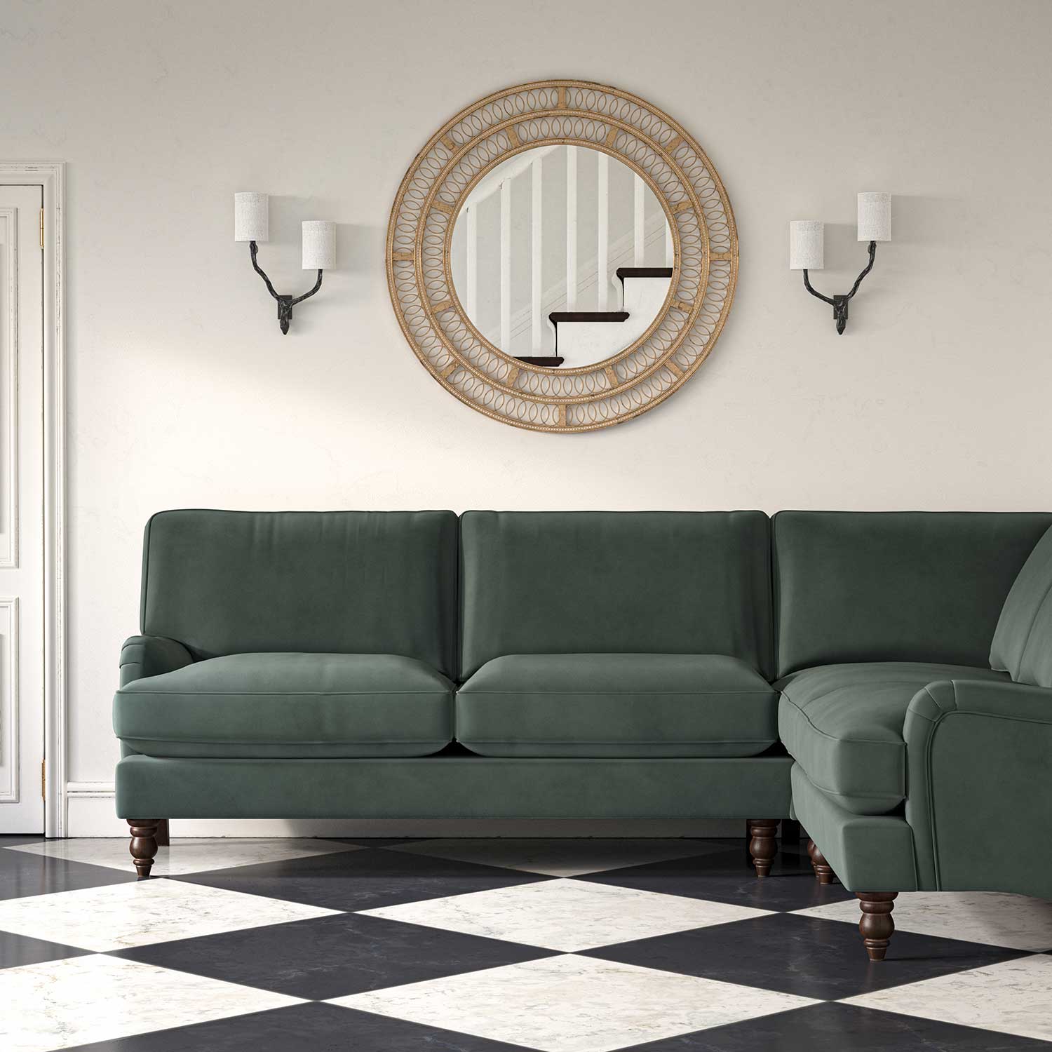 Sofa upholstered in a grey velvet upholstery fabric 
