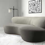 Sofa upholstered in a grey velvet upholstery fabric 
