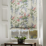 Blind in a printed linen fabric with a wisteria floral pattern in light colours.