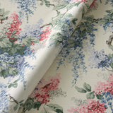Printed linen fabric with wisteria floral pattern in light colours for linen curtains, blinds and upholstery.