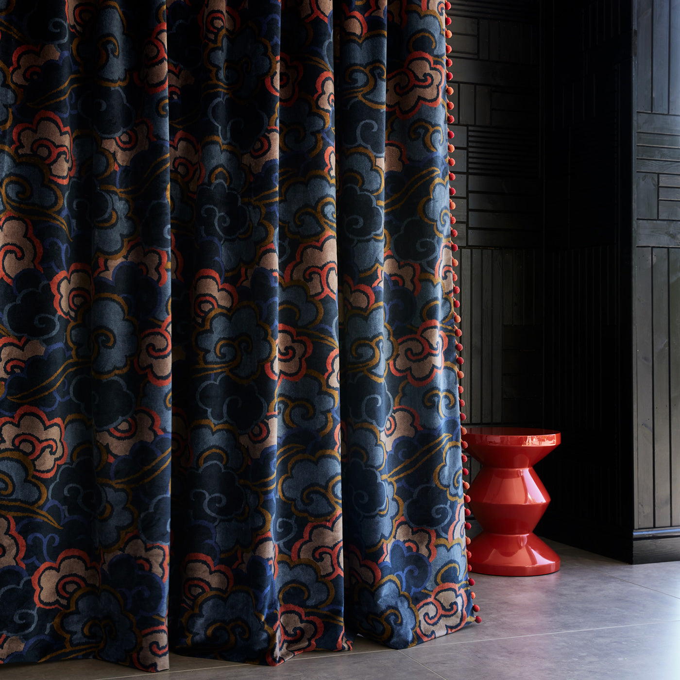 Velvet curtains upholstered in a printed velvet fabric with enchanting landscape of abstract clouds design in multicolours.