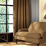 Living room featuring a sofa and curtains in a plain brass coloured eco-friendly fabric