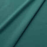 Fabric swatch of a eco-friendly plain teal fabric for curtains and upholstery