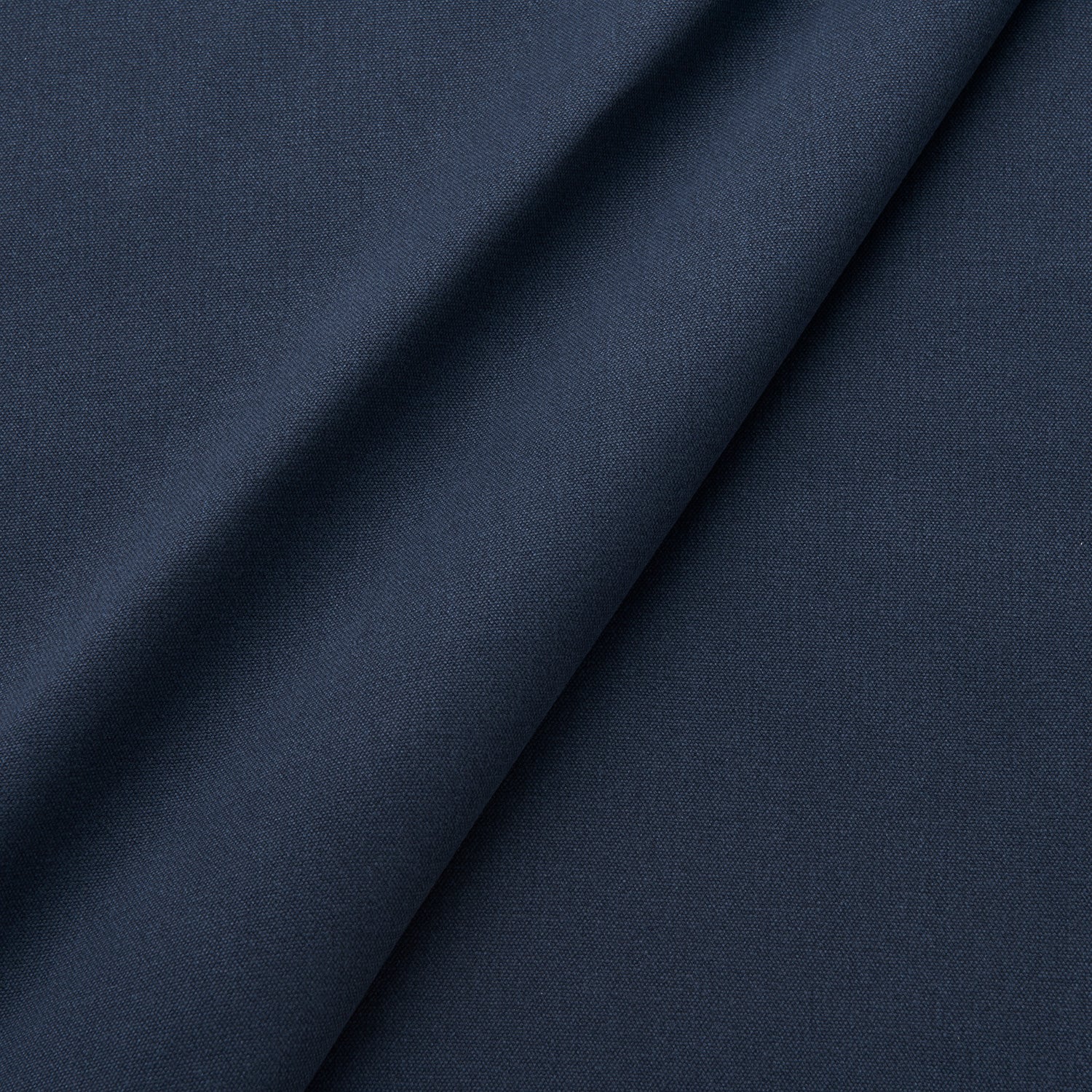 Fabric swatch of a eco-friendly plain midnight blue fabric for curtains and upholstery