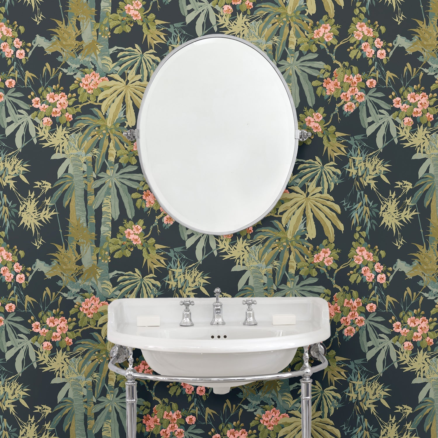 Bathroom with a tropical wallpaper in navy with exotic, floral blossoms intertwined with bamboo.