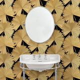 Bathroom showcasing a contemporary floral wallpaper with tropical palms in gold and black.