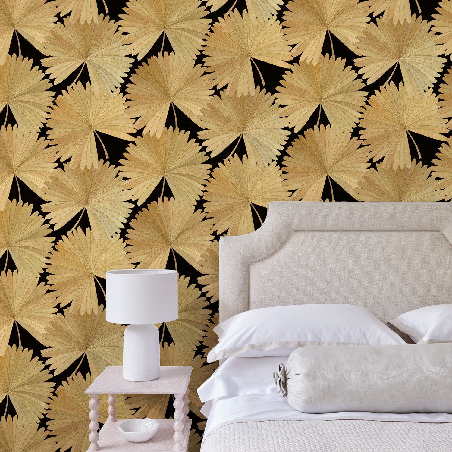 Bedroom showcasing a contemporary floral wallpaper with tropical palms in gold and black.