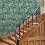Inspired by an 18th-century garden tapestry, this blue wallpaper features the timeless beauty of English Oak canopies