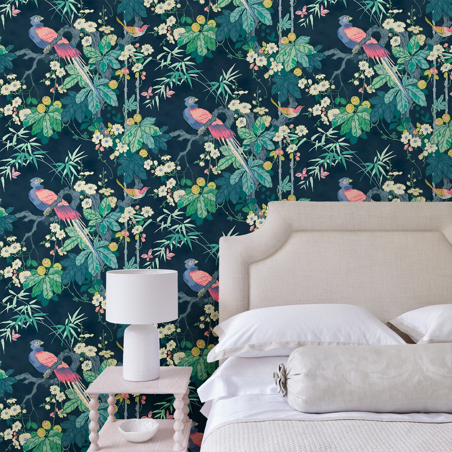 Bedroom featuring a navy floral wallpaper with exotic birds.