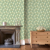 Capturing the beauty of the forest floor, this green wallpaper features leaves and flowers
