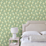 Capturing the beauty of the forest floor, this green wallpaper features leaves and flowers