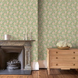 Capturing the beauty of the forest floor, this pink wallpaper features leaves and flowers