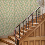 Capturing the beauty of the forest floor, this pink wallpaper features leaves and flowers