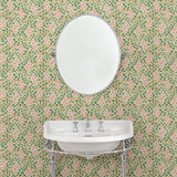 Capturing the beauty of the forest floor, this pink wallpaper features leaves and flowers