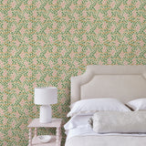 Capturing the beauty of the forest floor, this pink wallpaper features leaves and flowers
