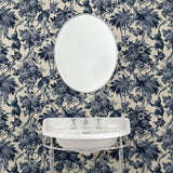 Tropical wallpaper with a classic monkey pattern in a bathroom.