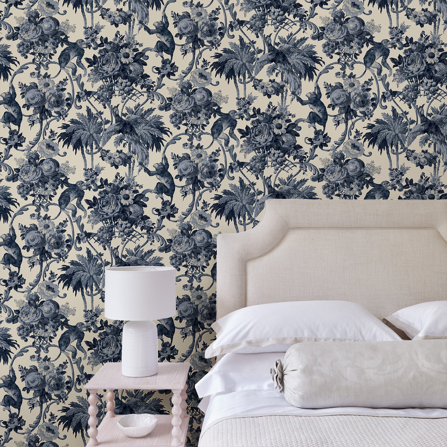 Bedroom featuring a tropical wallpaper with a classic monkey pattern.