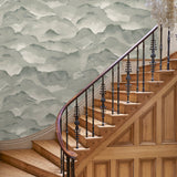 Hallway with an abstract wallpaper in a monotone colourway.