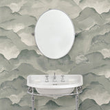 Cloakroom with an abstract wallpaper in a monotone colourway.