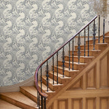 Hallway with stylish abstract wallpaper featuring dramatic, undulating waves.