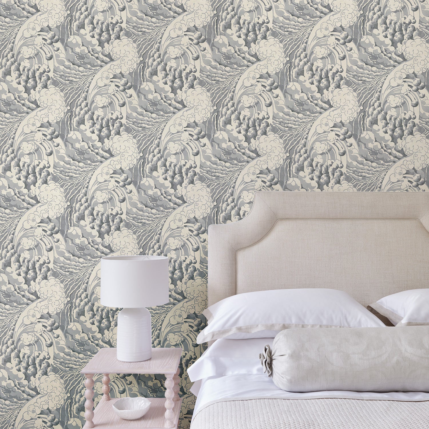 Bedroom with stylish abstract wallpaper featuring dramatic, undulating waves.