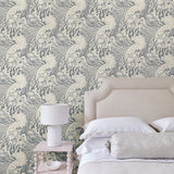 Bedroom with stylish abstract wallpaper featuring dramatic, undulating waves.