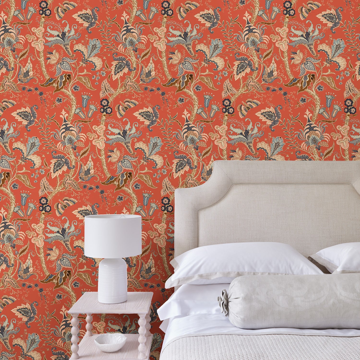 Bedroom with a tropical wallpaper in chilli showcasing beautiful botanicals and butterflies.