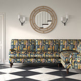 Sofa in a printed velvet fabric with city buildings in blue and yellow colours.