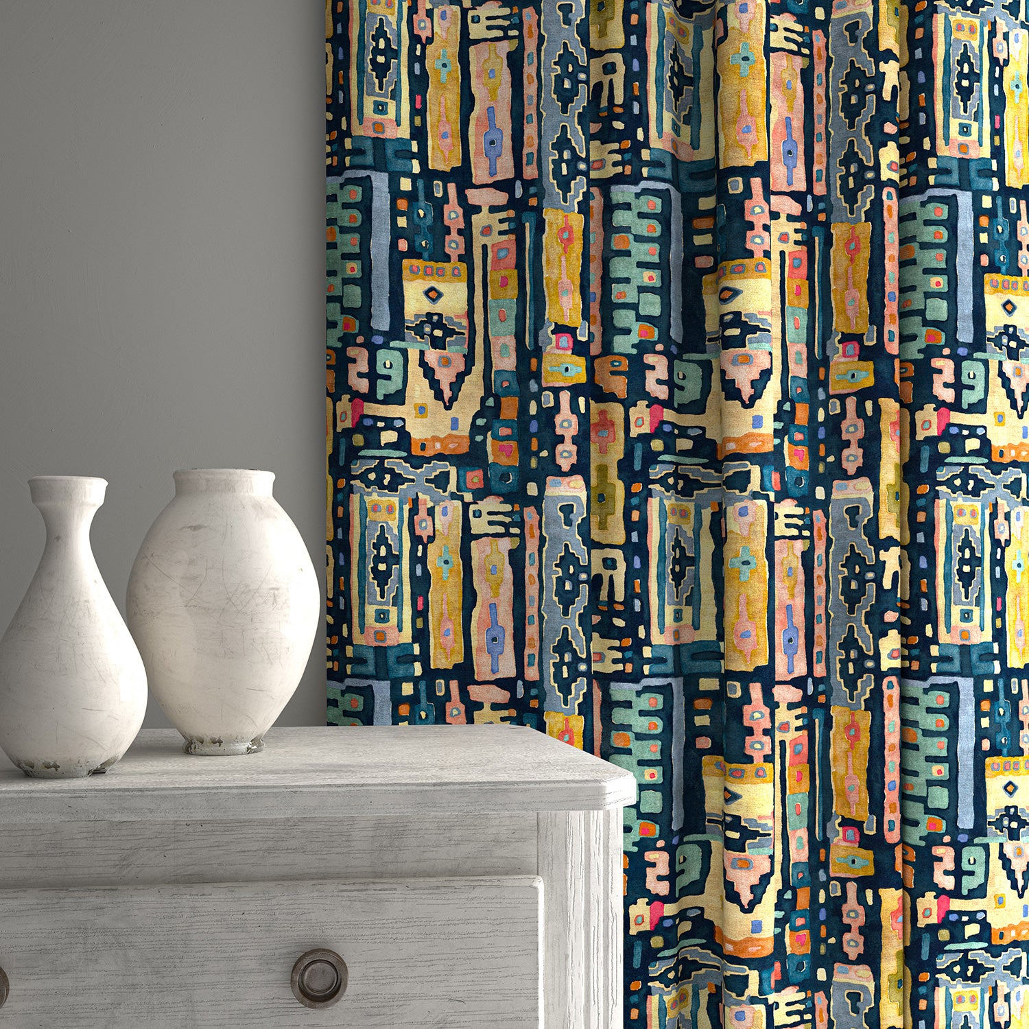 Curtains in a printed velvet fabric with city buildings in blue and yellow colours.