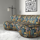 Sofa in a printed velvet fabric with city buildings in blue and yellow colours.