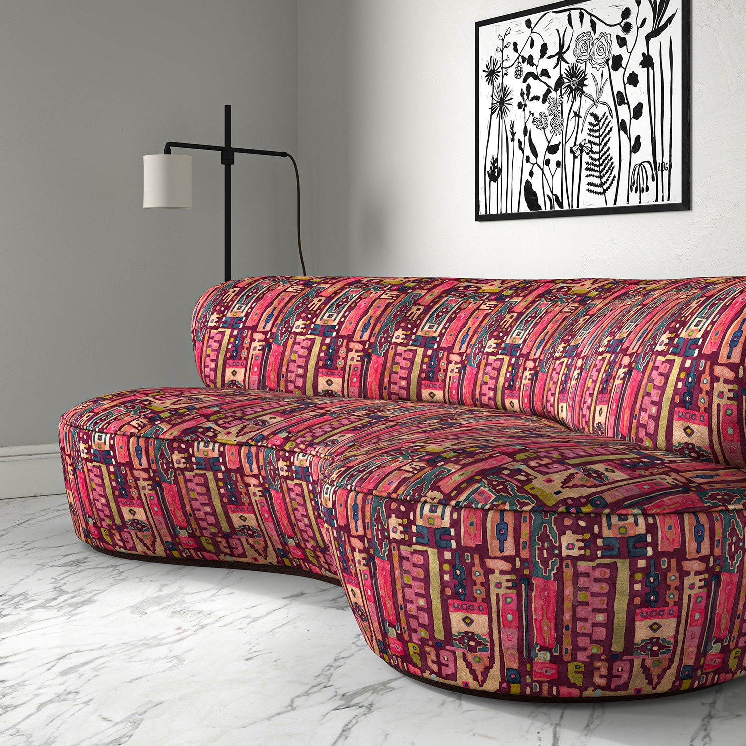 Sofa in a printed velvet fabric with city buildings in pink colours.