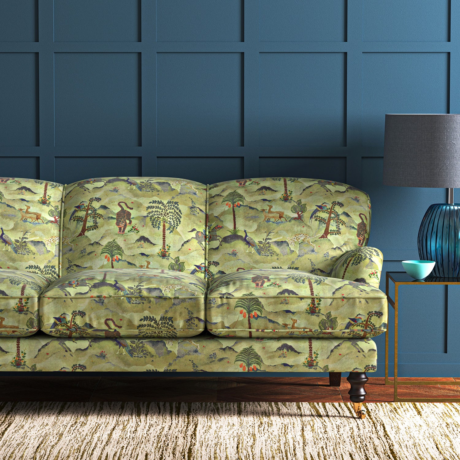 Sofa upholstered in a green cotton velvet fabric with painted animals and characters