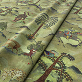 Fabric swatch of a green cotton velvet fabric for curtains and upholstery with painted animals and characters