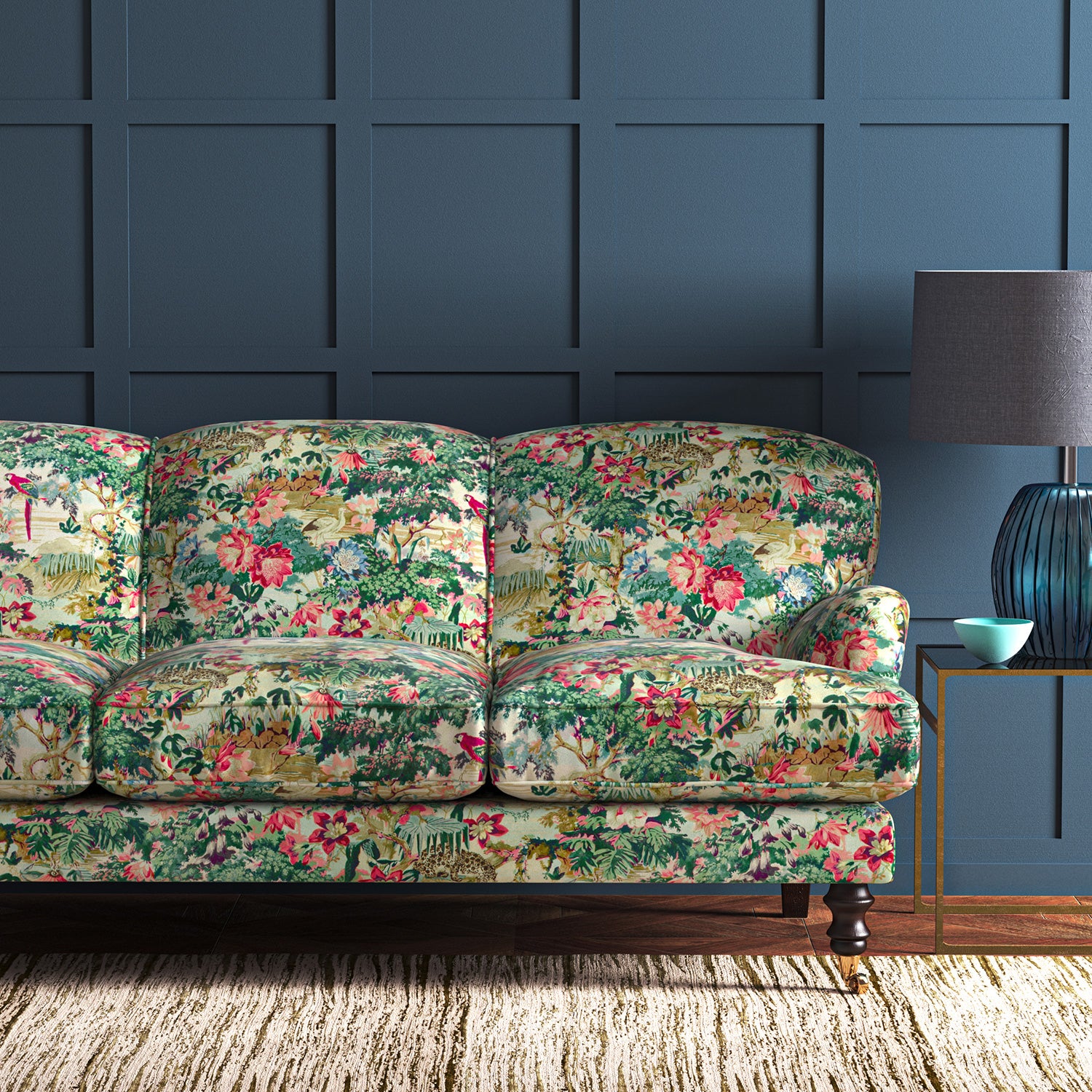 Sofa in a printed cotton velvet with a tropical jungle scene