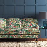 Sofa in a printed cotton velvet with a tropical jungle scene