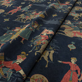 Sample of a printed velvet fabric showcasing lively horses and bedecked warriors in blue