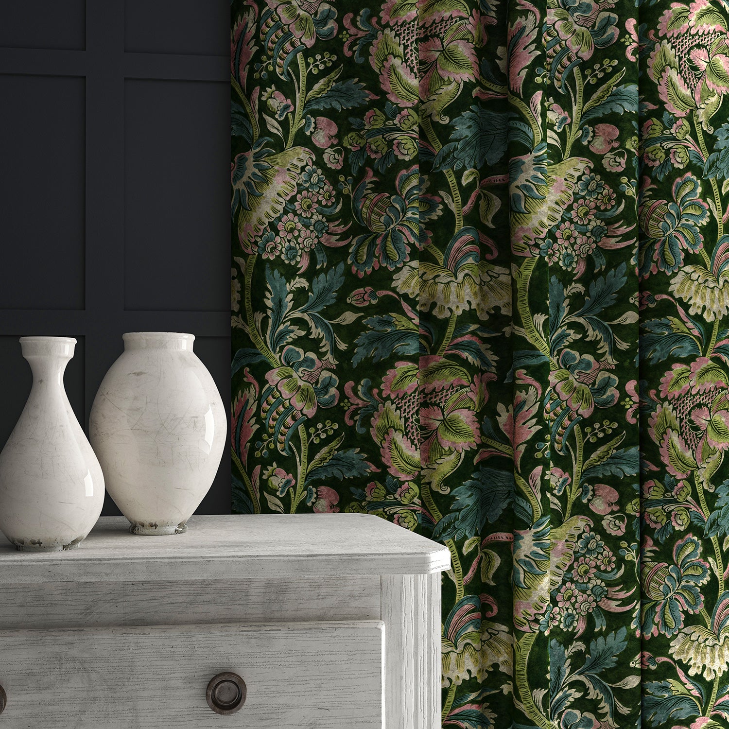 A printed velvet fabric showcasing an archival document, circa 1700s, this stylised floral is lavish, graceful, and timeless in green, shown as curtains