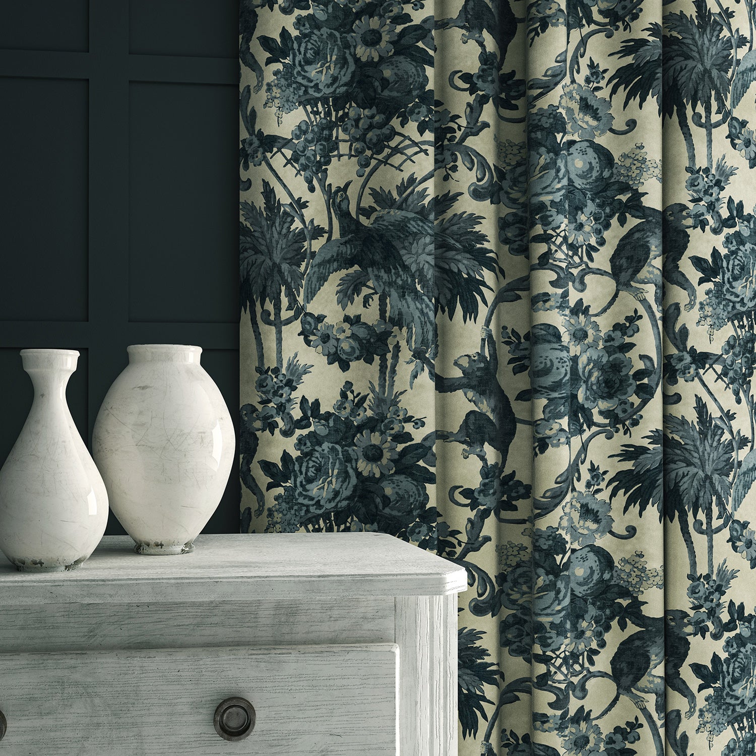 A printed velvet fabric showcasing a landscape of palms and monkeys in blue and cream, as curtains