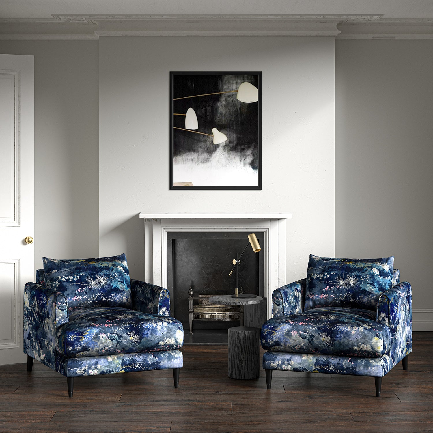 Armchairs in printed velvet fabric with painterly-style skyscape design in blue colours.
