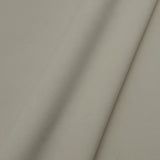 Fabric swatch of a plain stain resistant velvet upholstery fabric in a neutral colour